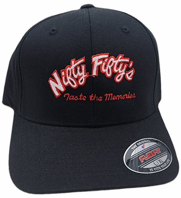 A black baseball cap with Nifty Fifty’s embroidered in red and white, and Taste the Memories written below in red script. A Flexfit sticker is on the bill.